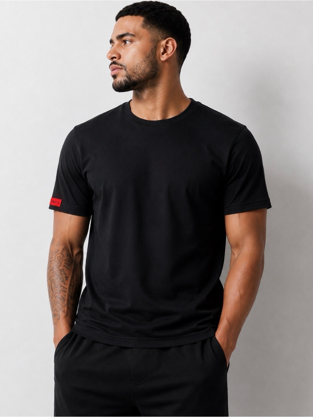 Unyx Black Crewneck Tee with Red Sleeve Tab